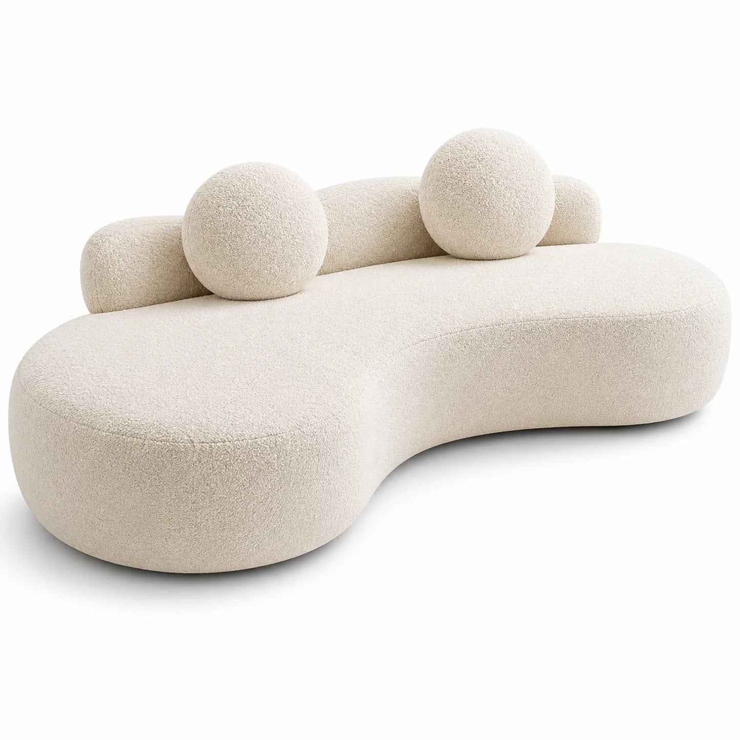Sofá curvo de tela bouclé beige con cojines esféricos